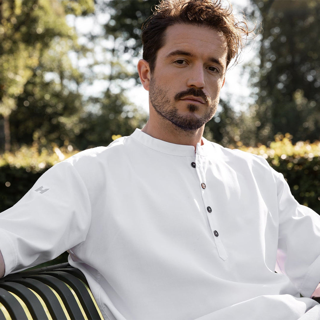Man relaxing and wearing a white premium t-shirt