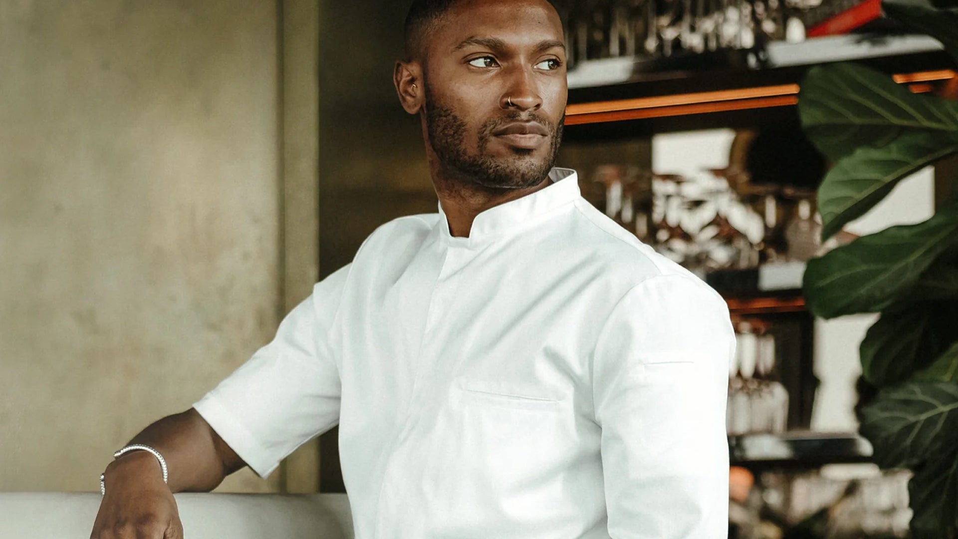 Le Nouveau Chef short sleeve chef coat on an Executive chef standing out side