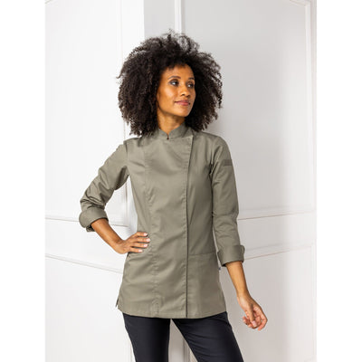 Woman wearing an olive green (Olivette) chef's coat with stylish sleeves against a white background