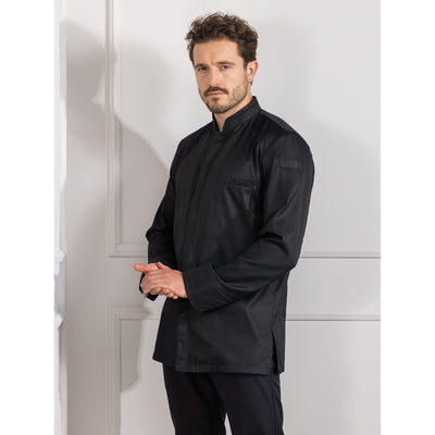 A man wearing a black Falco, european chef coat by LNC