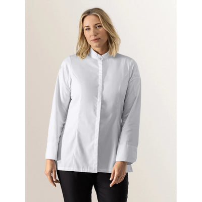 Woman wearing a white long-sleeve modern chef coat with minimal details