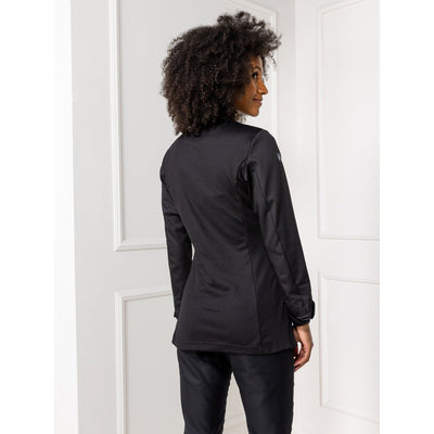 Woman wearing a black chef's coat with hidden closure, stretch back panel 