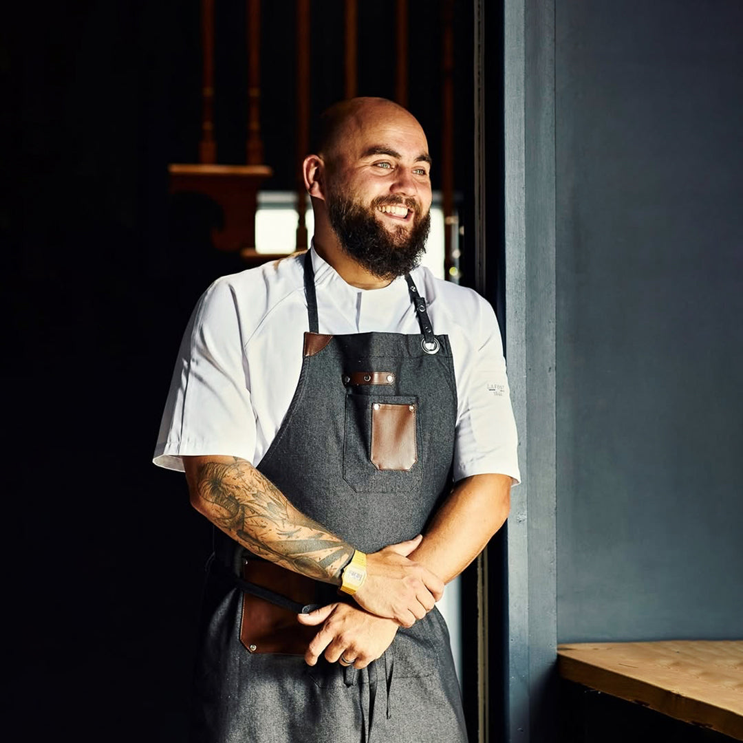 Executive chef in front of house professional wearing Lefort